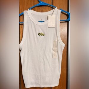 A New Day women’s white tank top featuring an embroidered olive design size M